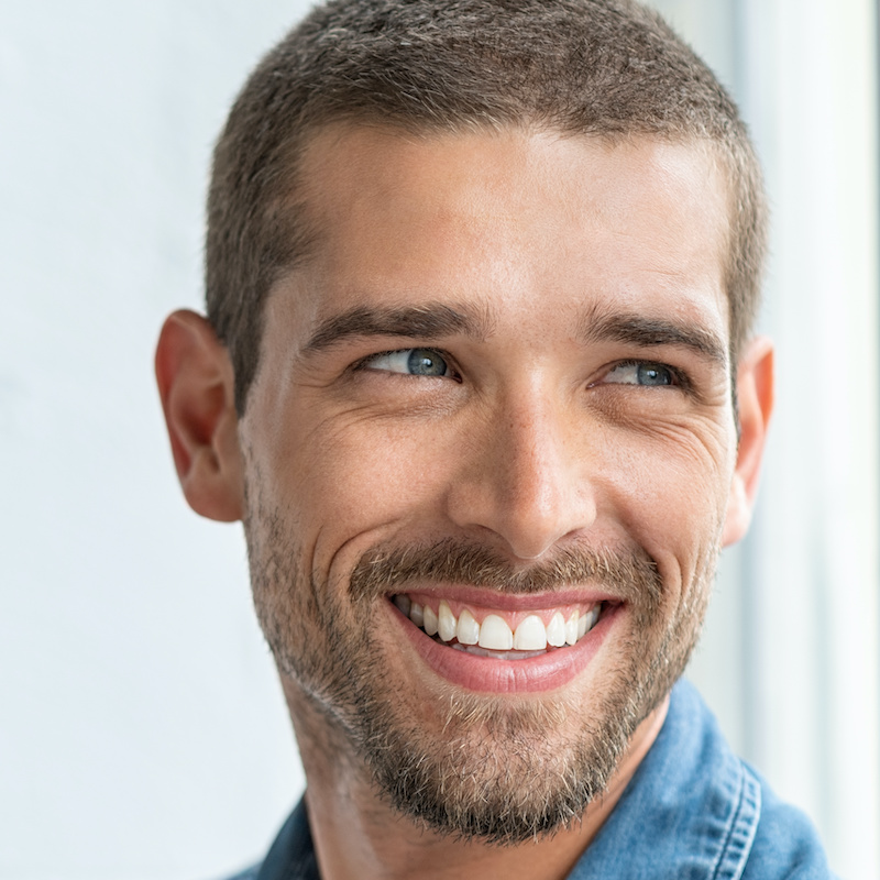 Acne Treatments happy smiling young man