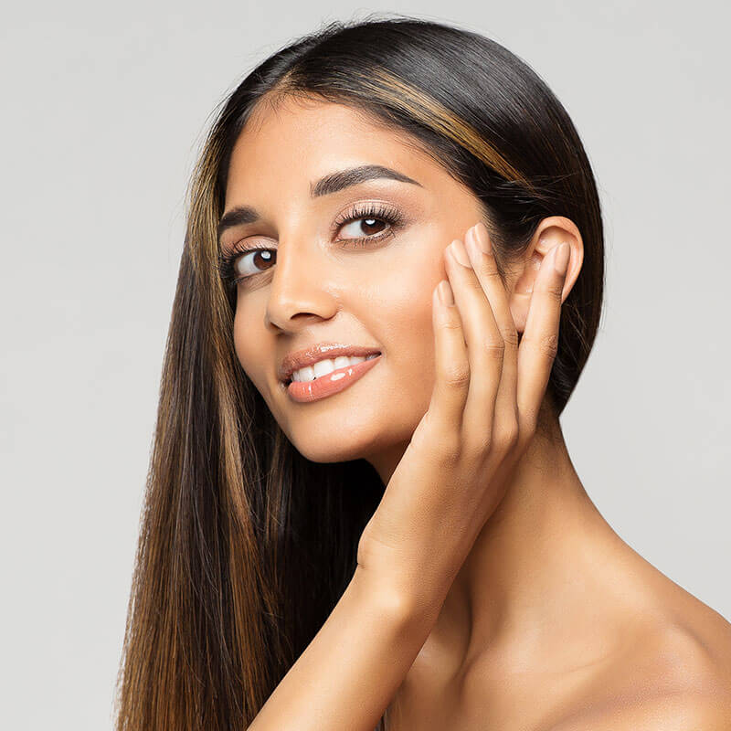 young woman with mole on her cheek