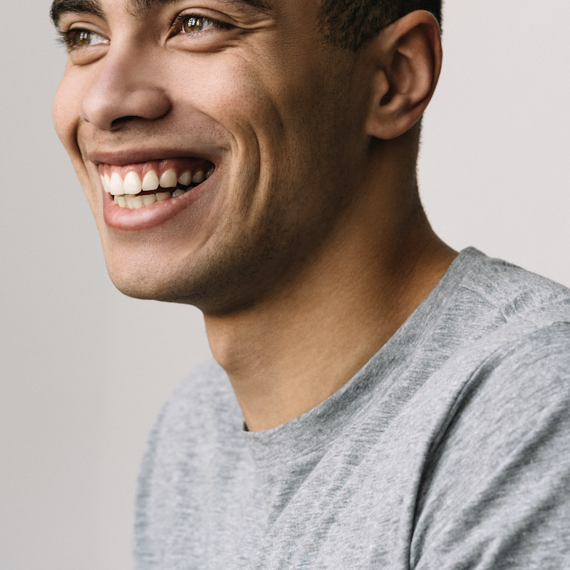 up-close image of smiling young man